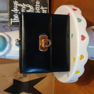 Salvatore Ferragamo Black Wallet with Gold Hardware